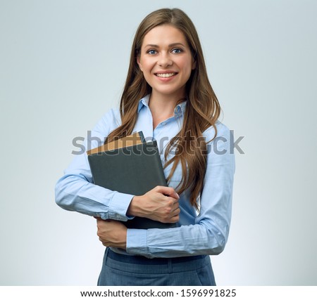 Smiling woman teacher holding books. isolated portrait female person.
