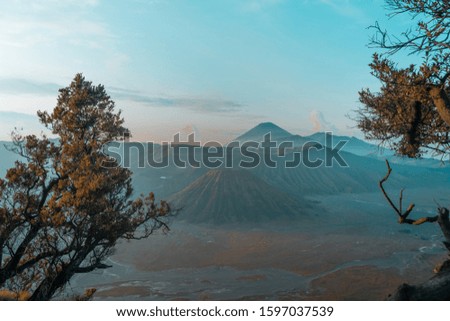 Mount Bromo volcano (Gunung Bromo) during sunrise from viewpoint on Mount Penanjakan, in East Java, Indonesia (Selected Focus)