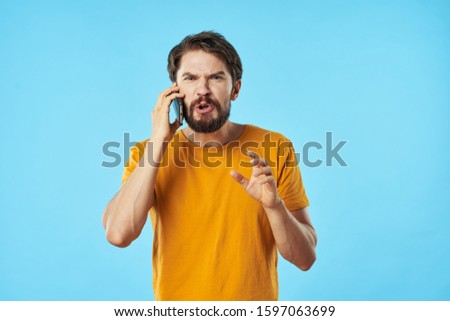 A man talking on a telephone providing technology communication services