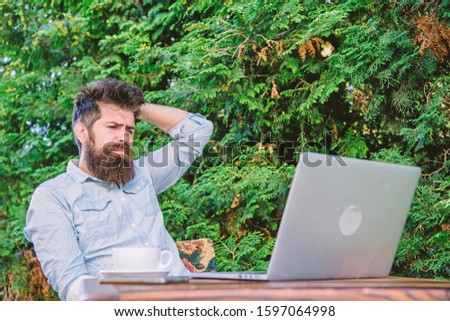 Find topic write. Reporter journalist daily routine. Working online. Online mass media worker. Write article for online magazine. Bearded hipster laptop surfing internet. Man looking for inspiration.