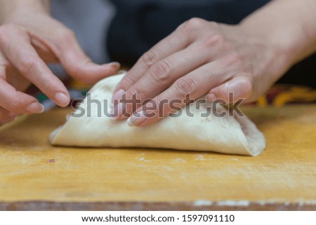 woman prepares soft, juicy korean manti