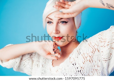 Portrait of a beautiful girl posing on a white background