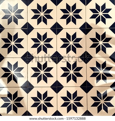 Geometric black and white ceramic tiles pattern.