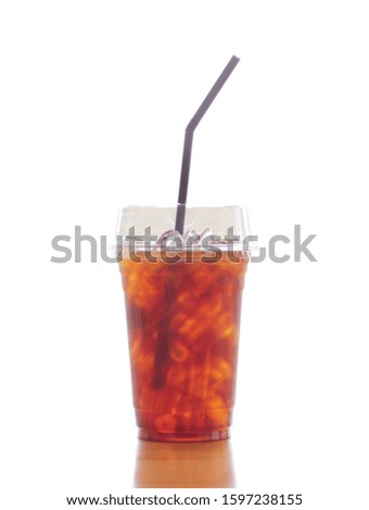 Black coffee with ice on white background.