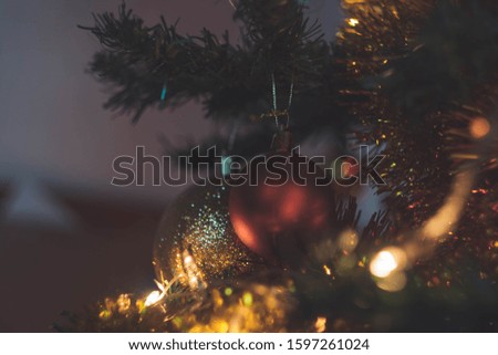 Christmas balls and gift on the tree