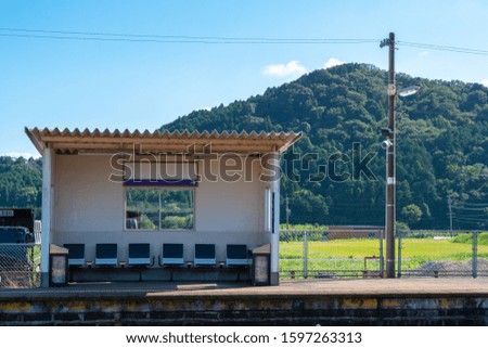 Summer countryside at station platform