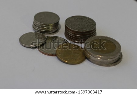 Thai Bath money isolated on white background. Collection of Thai Baht coins 