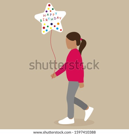 Little girl with a balloon in hand