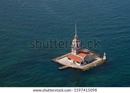 Maiden's tower Aerial Shooting. Aerial Helicopter View of Maiden's Tower in Uskudar Istanbul / Kiz Kulesi, Turkey