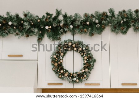 Christmas decor, kitchen decorated for the holiday, selective focus