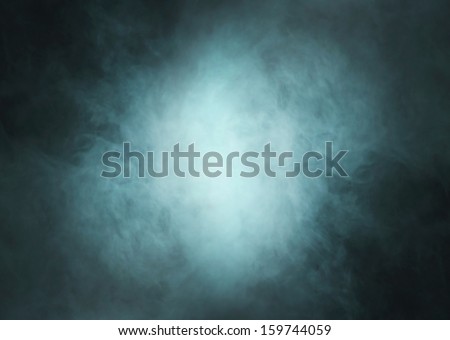 Abstract texture of the green smoke over black background