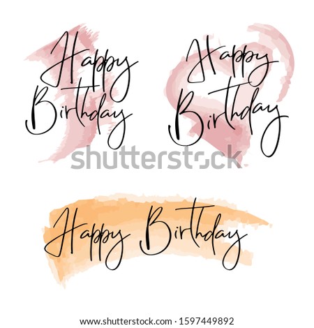 Happy Birthday text on watercolor brush stroke