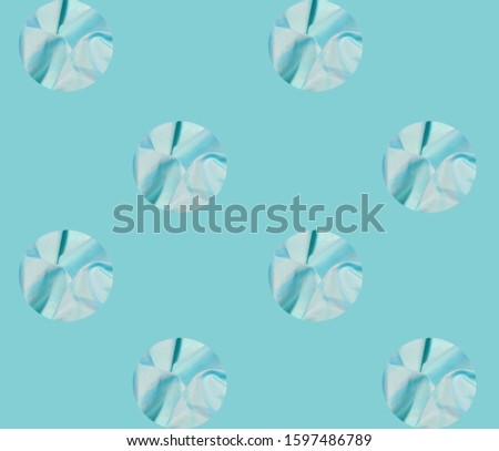 Geometric seamless pattern. Holes on a light green background. Satin or silk fabric with large folds is visible in the hole. Layout template for design, textile industry, wallpapers, backgrounds.