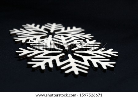 Snowflakes wooden painted with white acrylic paint