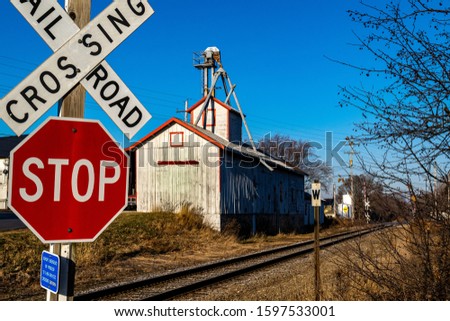 A grain depot stands beside a railroad track in the village of Richfield, Wisconsin