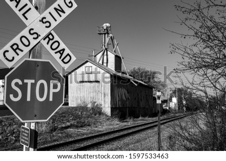 A grain depot stands beside a rail line in the village of Richfield, Wisconsin