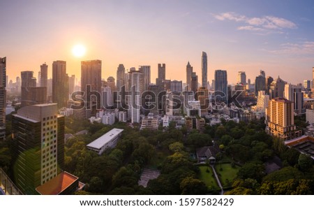 sunlight rooftop view skyline bangkok twilight, office buildings, living, condominium in bangkok city  skyline top view Downtown and business office bank financial in capital city of thailand asian 