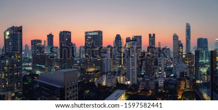 sunset rooftop view skyline panoramic twilight, office buildings, living, condominium in bangkok city  skyline top view Downtown and business office bank financial in capital city of thailand asian 