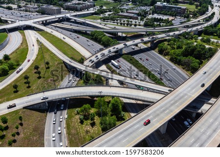 Aerial view of Interstate 85 and Interstate 20 interchange ramps and bridges in Atlanta Georgia.   Royalty-Free Stock Photo #1597583206