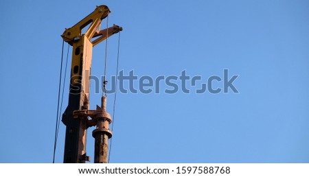 Piling machine with space for inserting text