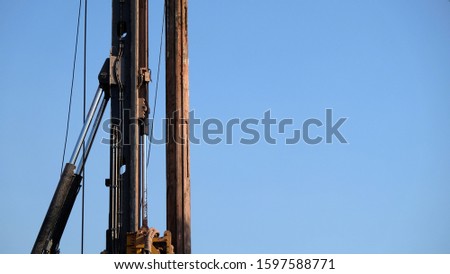 Piling machine with space for inserting text