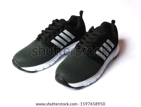 dark green casual sports shoes/sneaker isolated on white background