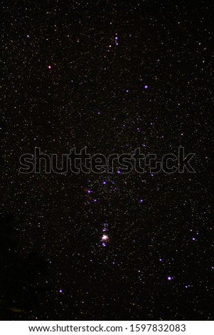 Shot of the orion constellation and the orion nebula at night as seen from mukteshwar.