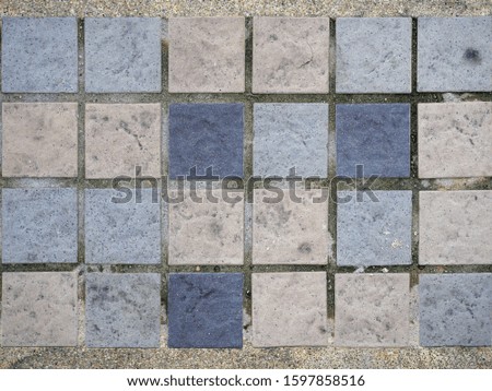 Top view of Thailand footpath tiles. - Special small various color square pattern. With a rock surface.