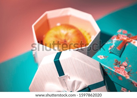 gift box with ribbon and bow of on a colored background