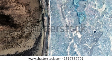 the border, abstract photography of the deserts of Africa from the air, aerial view of desert landscapes, Genre: Abstract Naturalism, from the abstract to the figurative, contemporary photo art