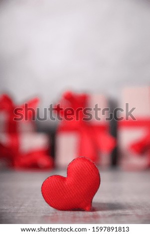 
Greeting card Valentine's day with hearts on wooden and gift background. With space for your text greetings  