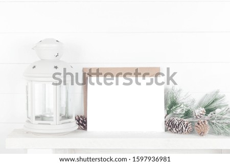 Christmas Mockup or Wedding Invitation Mock up on White Background with Fir Branch and Lantern