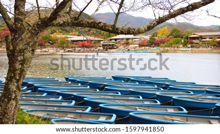 Blue boats at Arashiyama in Kyoto, Japan