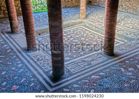 The floor of a courtyard in a ruined estate in the ancient Roman city of Pompeii (destroyed in 79 BC), Italy.  The photo is colored with the HDR-Effect.