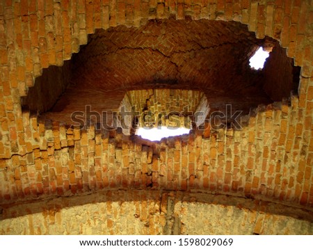 Brickwork with a hole in the wall. Close-up.                            