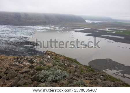 Panoramic view of an arm of Vatnajokull Glacier in Iceland's Skaftafell National Park emptying into a glacier lagoon