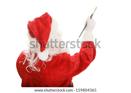 Santa Claus using an artist's paint brush to paint a picture or message.  Isolated design element.  