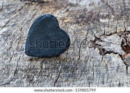 blank slate heart on wood background