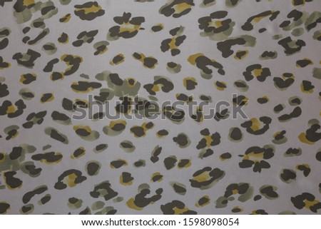 Overview of spotty white fabric with textile texture background