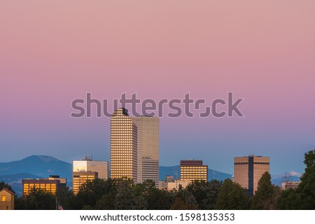 Denver skyline under pink sky