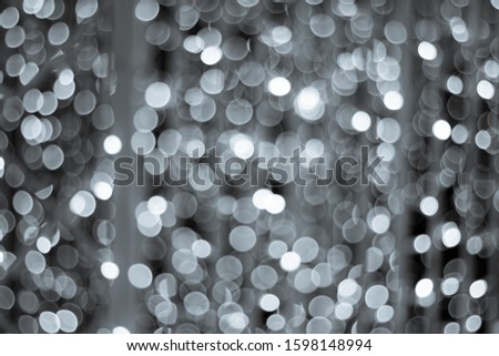 White glitter abstract bokeh background pattern