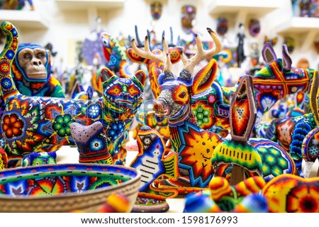 Traditional huichol bead ornament figures mexican culture work