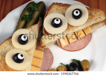 funny sandwiches kids food on a white plate