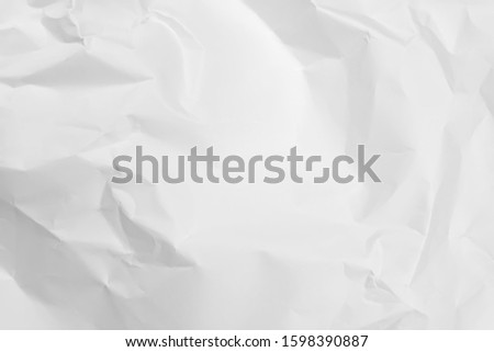 White crumpled paper texture background.