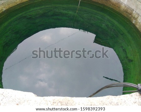beautiful view of water in a well of Indian farm 