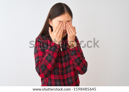 Young chinese woman wearing casual jacket standing over isolated white background rubbing eyes for fatigue and headache, sleepy and tired expression. Vision problem