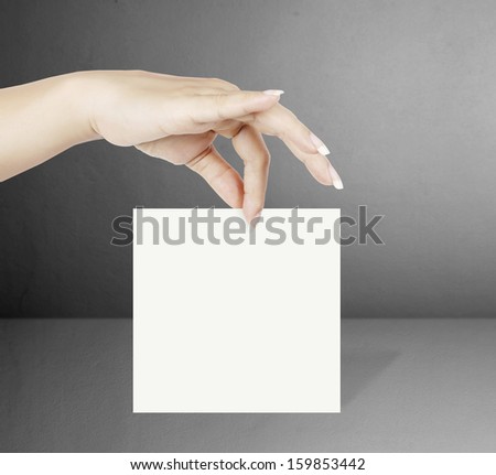 business card blanks in a hand 