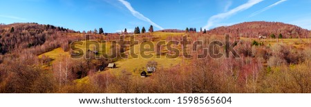 Romanian old sheepfold on the top of the hill in the fall season panorama, Fantanele village, Sibiu county, Cindrel mountains, 1100m, Romania Royalty-Free Stock Photo #1598565604