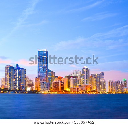 City of Miami Florida, colorful night panorama of downtown business and residential buildings