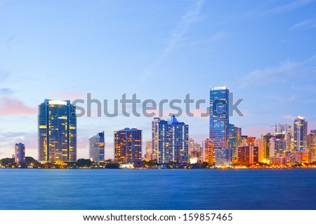 City of Miami Florida, colorful night panorama of downtown business and residential buildings